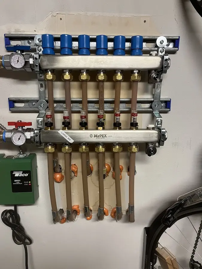 Plumber performing Water Heater Repair at a residential property in White Bear Lake